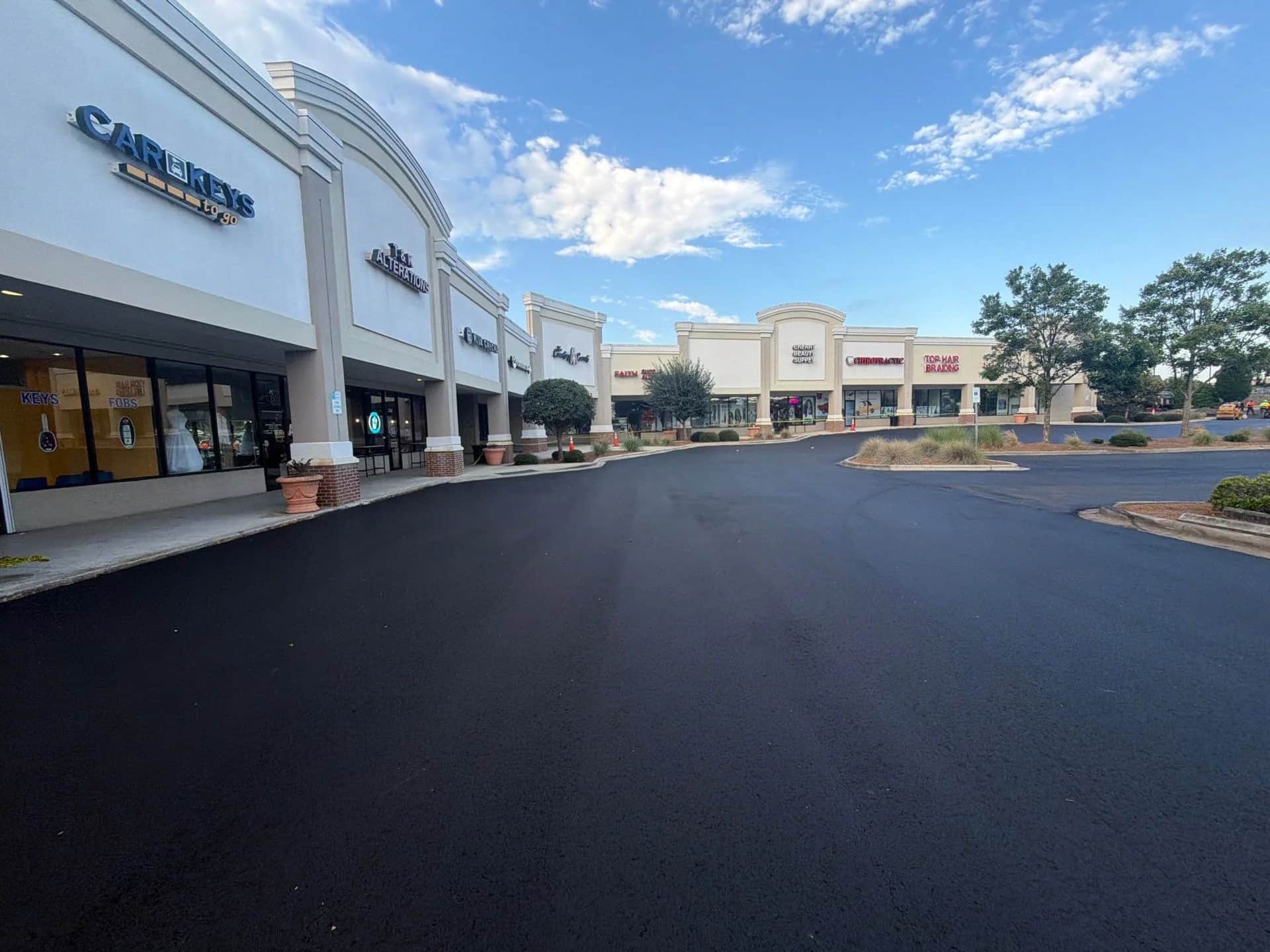 Freshly paved storefront frontage at Northeast Plaza in Rock Hill, SC
