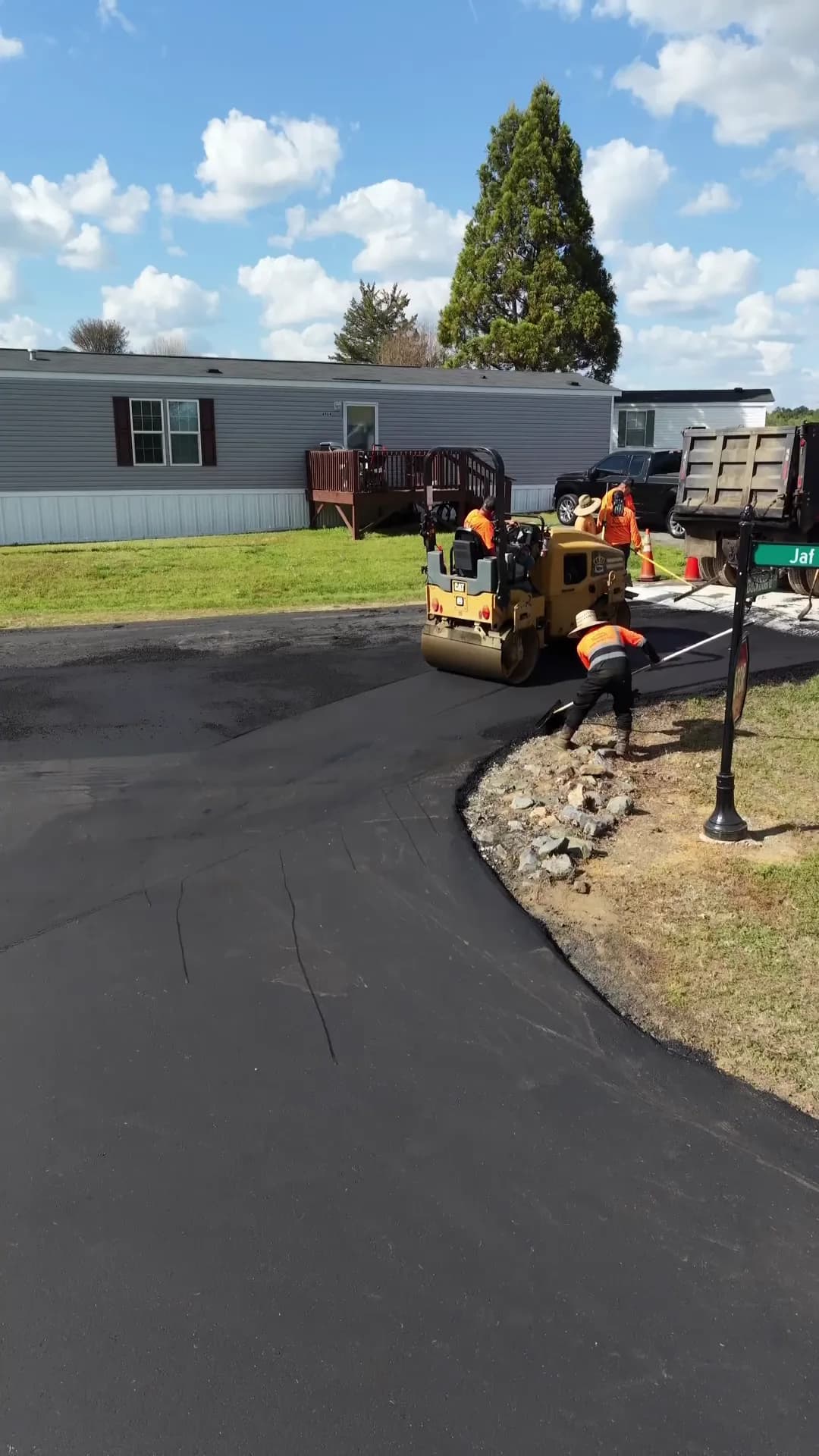 Roller finishing a resurfaced curve at Southern Hills, Concord NC