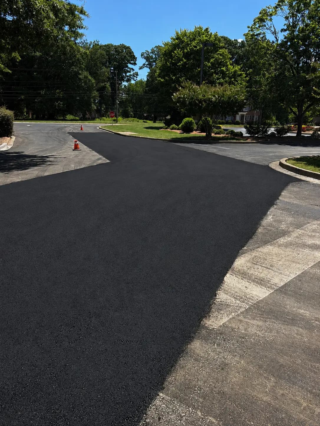 Freshly laid asphalt cooling to its finished surface