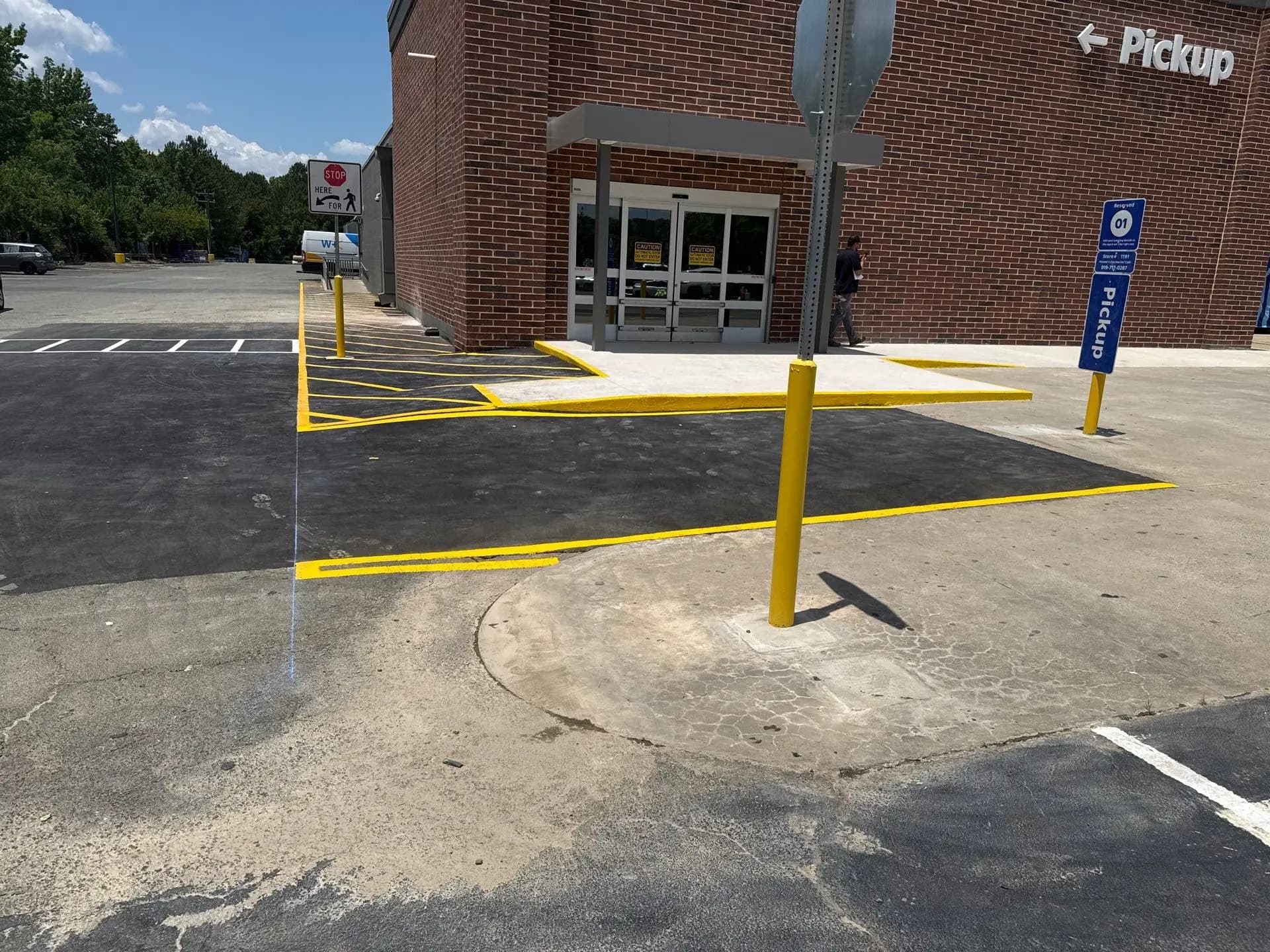 Asphalt patch repair at the Walmart lot in Hillsborough NC