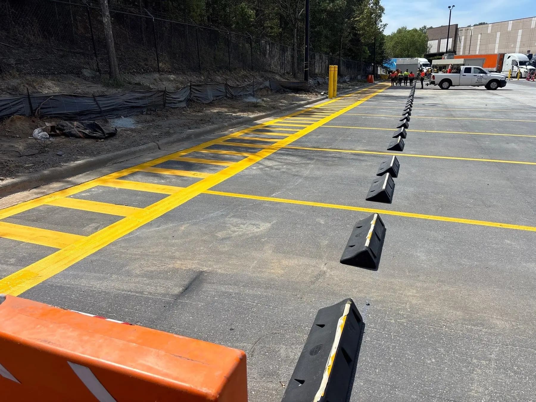 Wheel stops and traffic markings at a distribution center