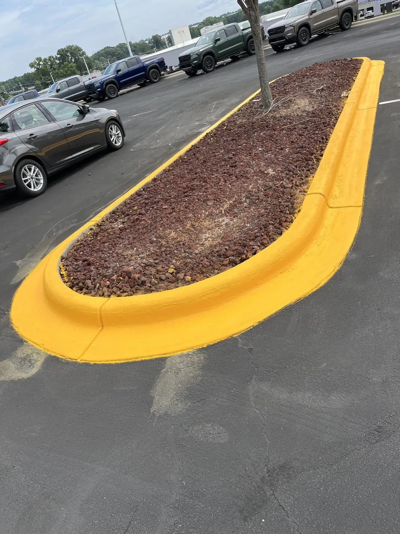 Curb paint reapplied around the storefront