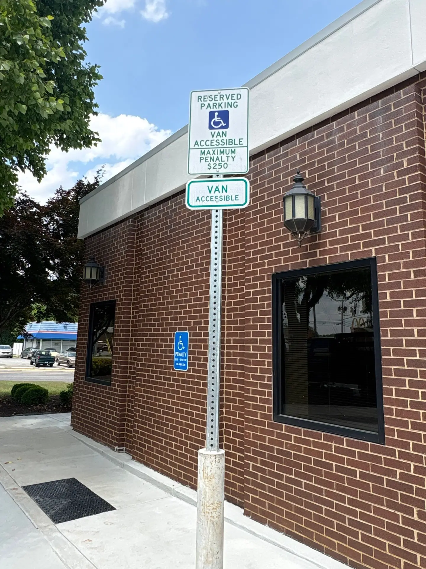 Van accessible reserved parking sign installed at First Citizens Bank in Lynchburg VA