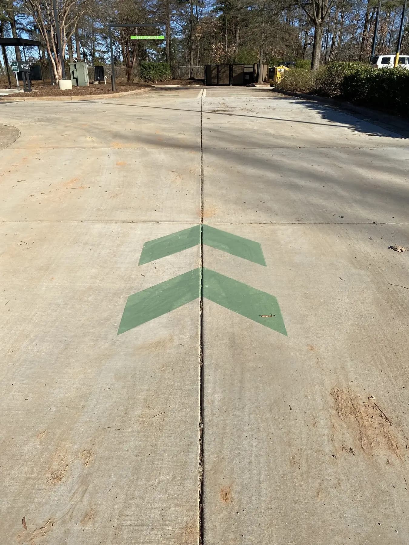 Green chevron hatching marked out at a Starbucks