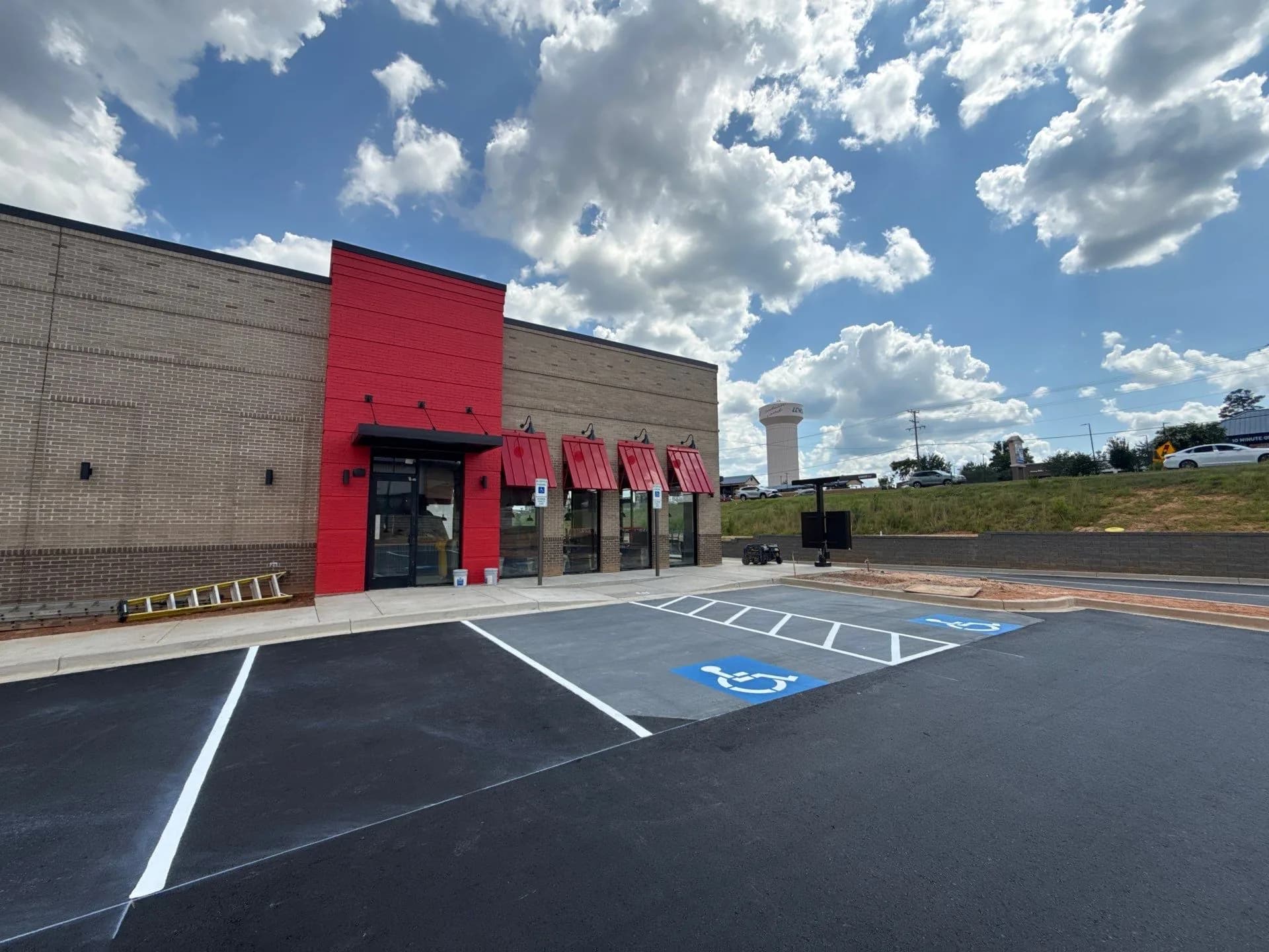 Fresh crosswalk hatching and accessible stalls at the Chick-fil-A in Concord, NC