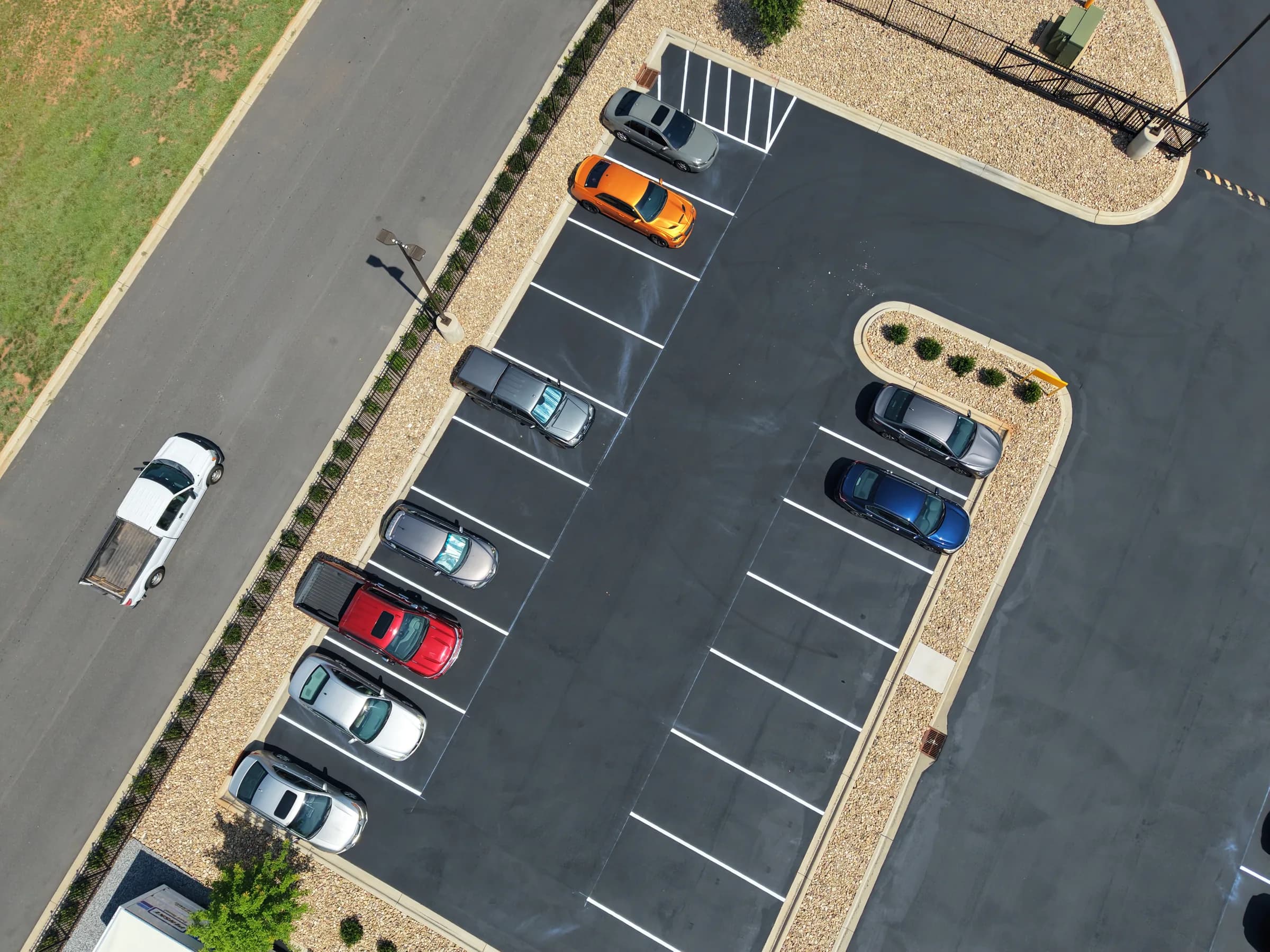 Sealed parking field with fresh white stall lines